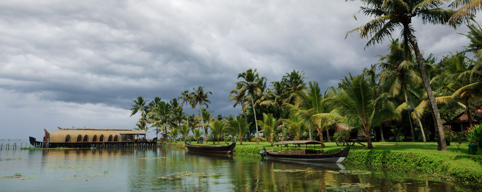 Explore the backwaters of Kerala during monsoon